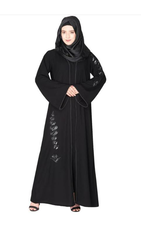 Opulent Hand Embroidered Front Open Black Abaya With A Unique Twisted Motif Of Sparkling Sequins