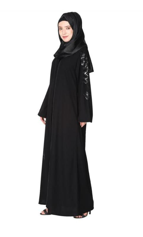 Opulent Hand Embroidered Front Open Black Abaya With A Unique Twisted Motif Of Sparkling Sequins